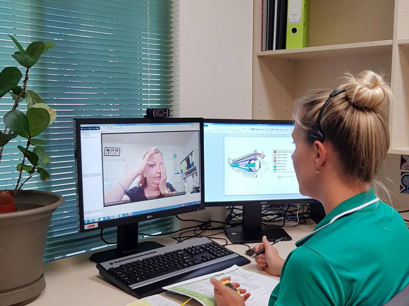 Midwest local Michelle Boyland communicates with her physiotherapist, Naomi Ramsay, via Telehealth.
