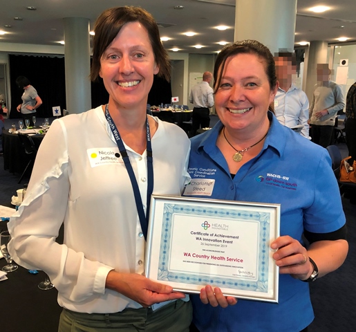 Nicole Jeffree, Senior Project officer (left) and Charlotte Steed, A/Chronic Conditions Care Coordinator from Bunbury Hospital receiving their WA Innovation award.