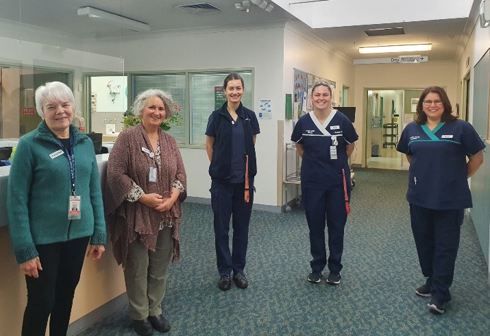 Five staff from Margaret River Hospital in hallway of ward