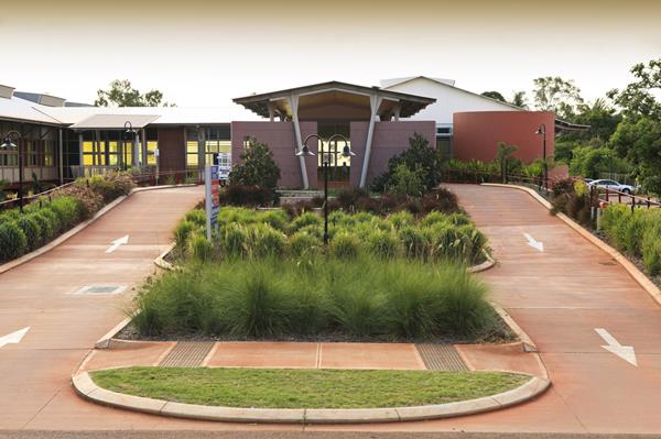 Exterior of Broome Health Campus with garden in foreground and building in background 