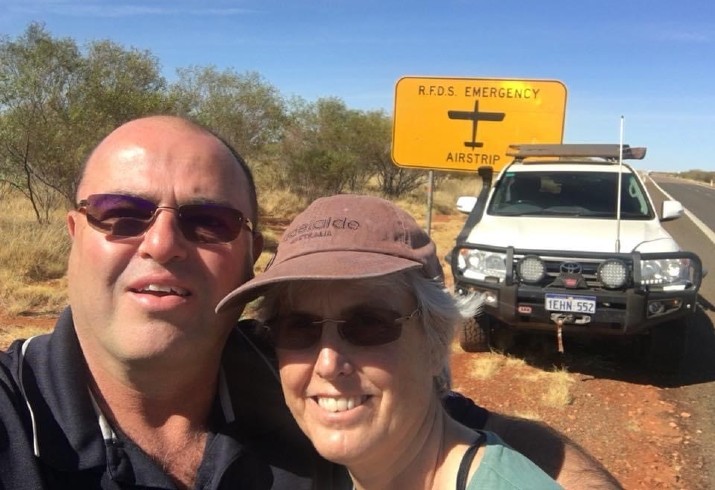 Dr Fitzclarence and her husband. 4WD and RFDS airstrip in the background