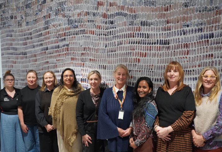 Group of staff smiling after completing their onboarding