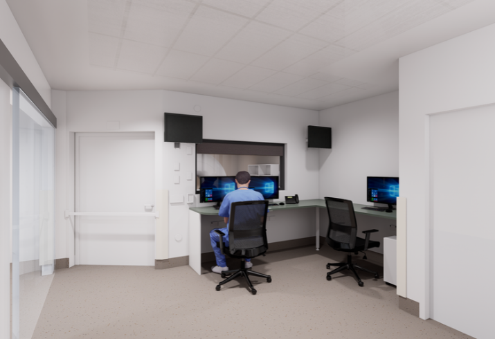 An artist's render of a clinical room shows a male figure sitting behind a computer facing a separate room behind an internal window