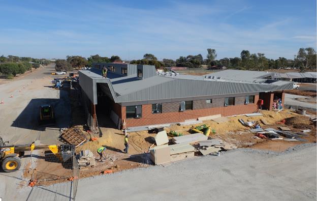 Building site with almost completed health centre