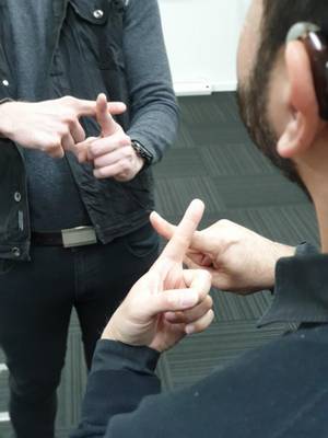 Hearing-impaired patient communicating with Auslan service.